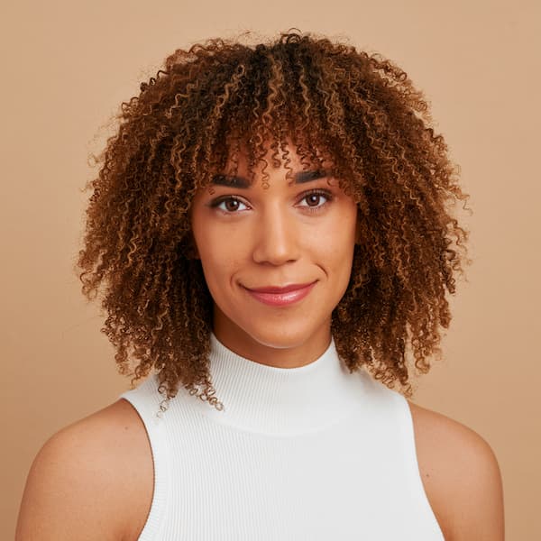 Coiled curly bob with Bangs